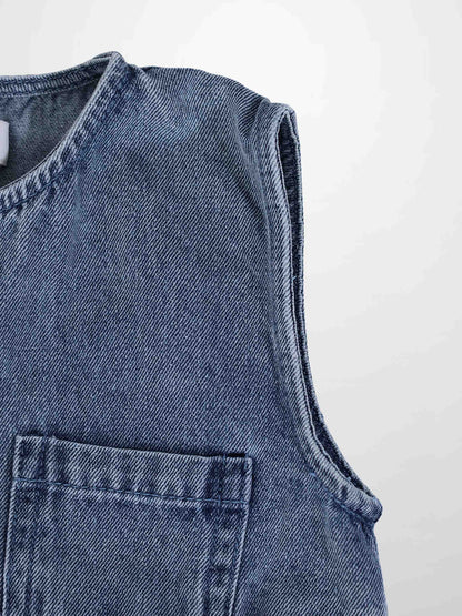 Blue denim romper with sleeveless top and front patch pocket, textured denim fabric.
