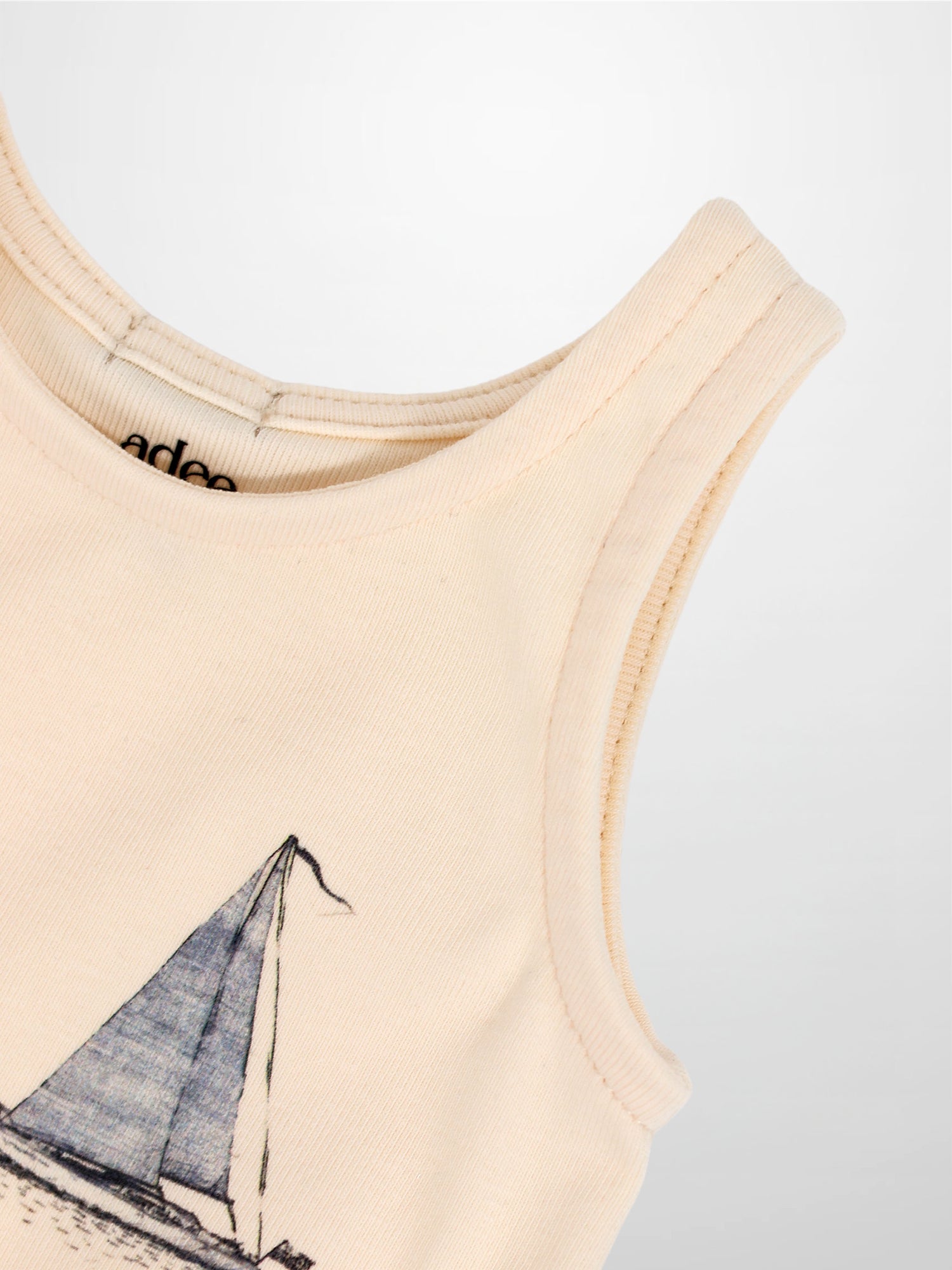 Sail Boat Romper for boys, cream color, sleeveless, Adee brand with sailboat print