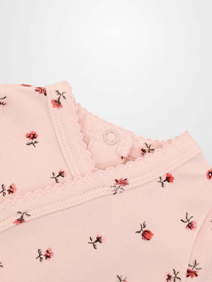 Pink Petal Stretchy girls top by Adee, pink floral print with scalloped neckline.