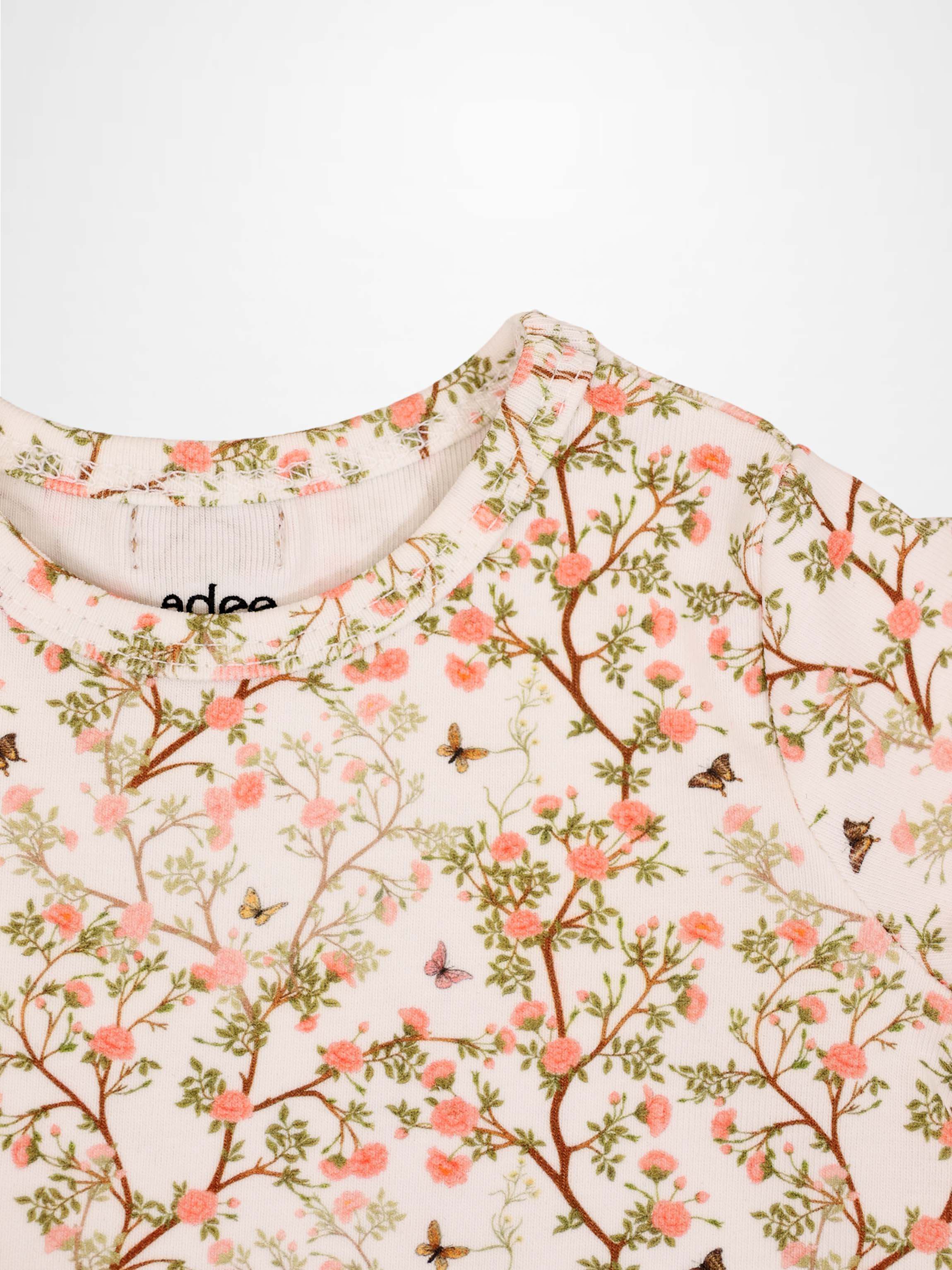 Spring Floral Short Sleeve T-Shirt by Adee; pink floral print on cream background.