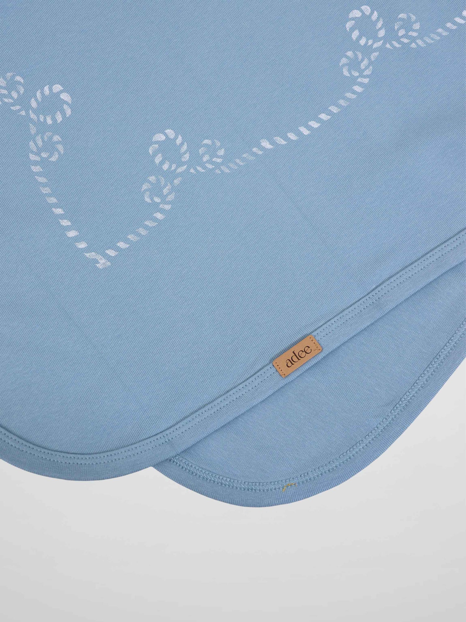 Blue anchor blanket by Adee; boys swaddle blanket in light blue with white rope-anchored pattern.