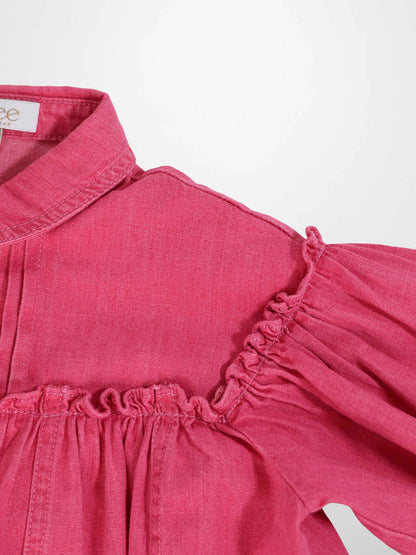 Pink denim dress with collared neckline, ruched yoke, and 3/4 sleeves.