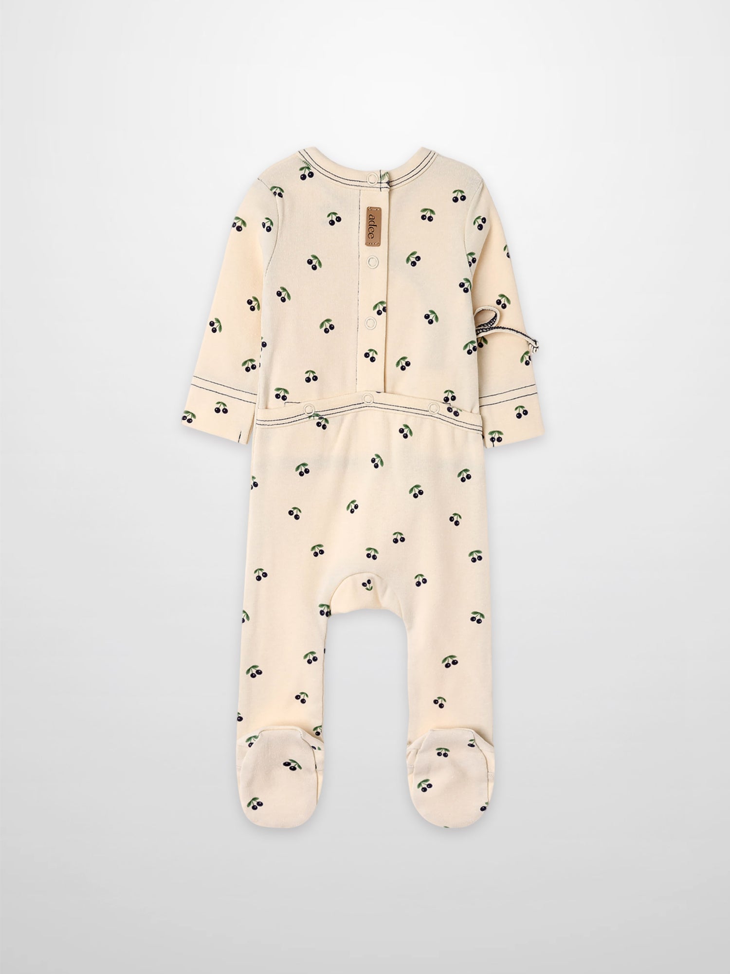 Blue Cherry Stretchy by Adee; cream footed romper with blue cherry print and green leaves.