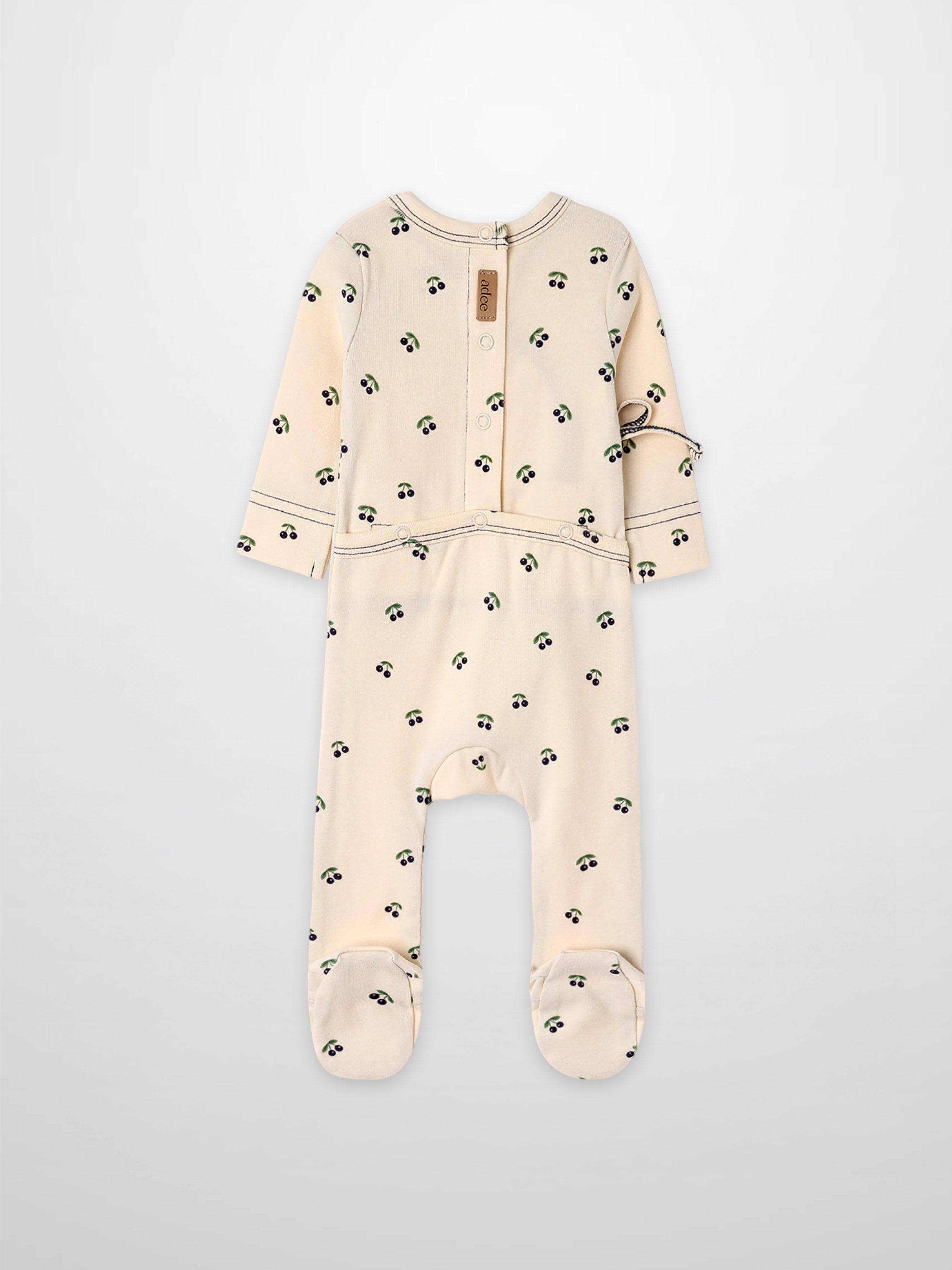 Blue Cherry Stretchy by Adee; cream footed romper with blue cherry print and green leaves.