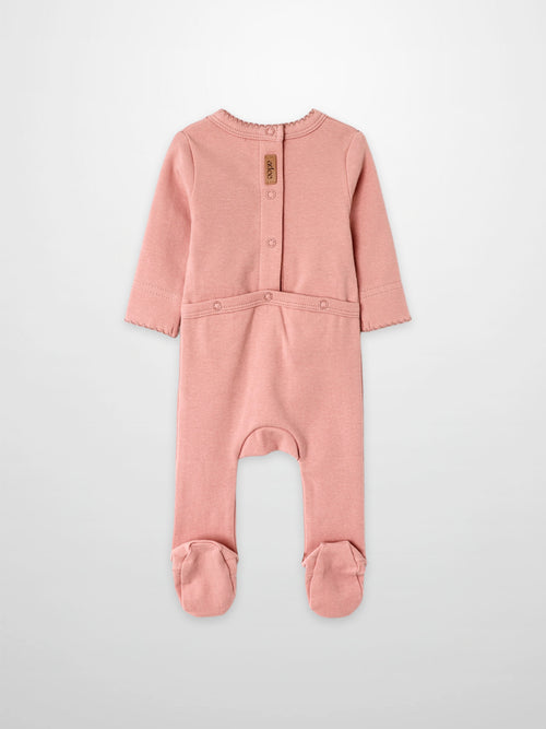 Girls Stretchies pink romper by Adee with lace trim and footed design