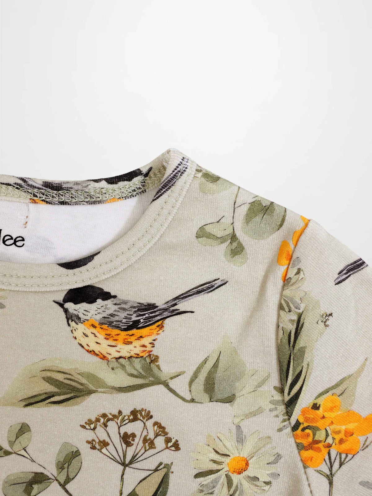 Garden Finch 3/4 Sleeve T-Shirt for girls, Adee, beige floral print with bird motif.
