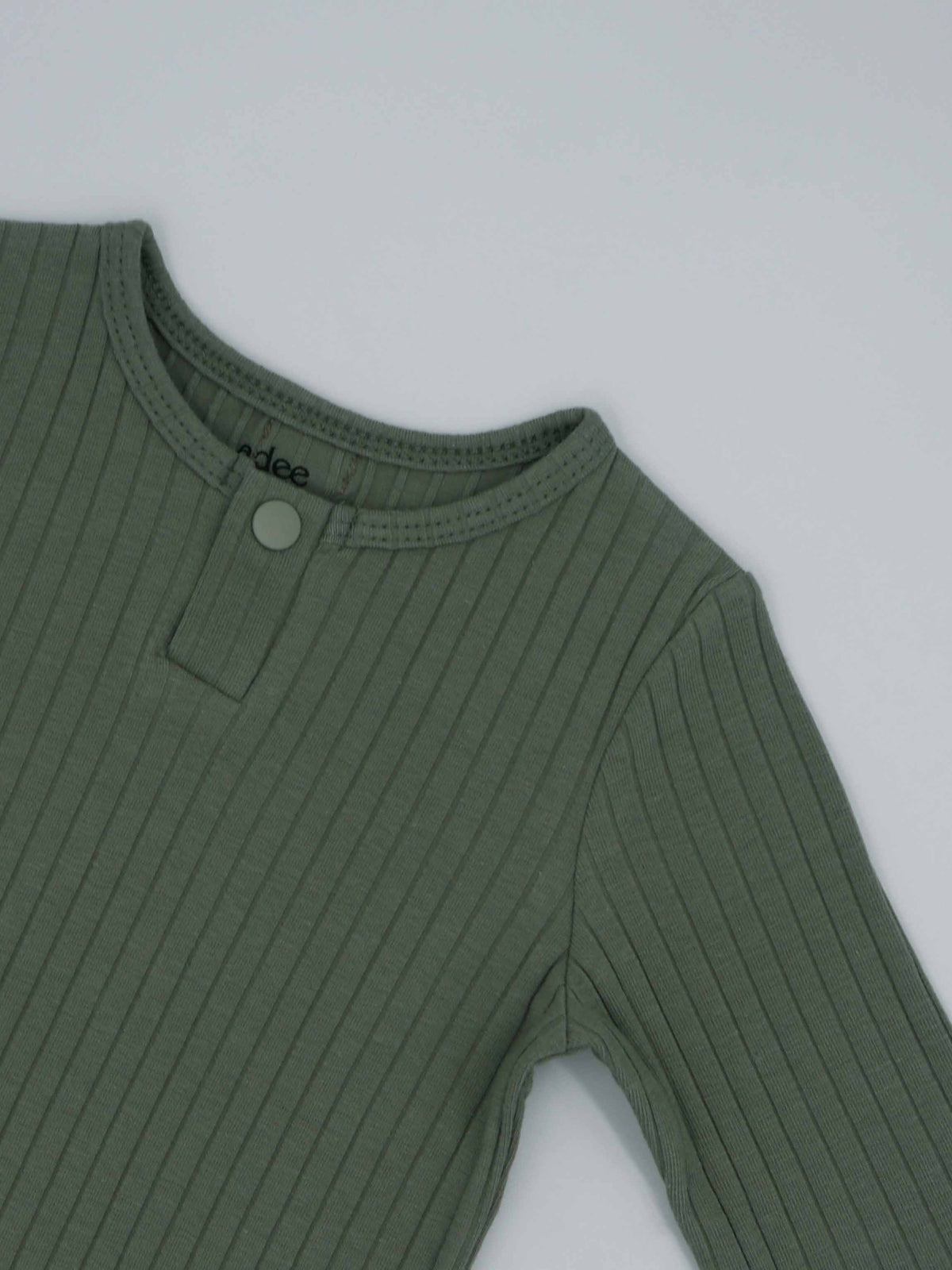 Green ribbed toddler henley shirt with a single snap at the neckline.