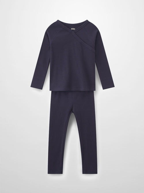 Navy thin-ribbed pajama set with crossover neckline, long-sleeve top and pants.