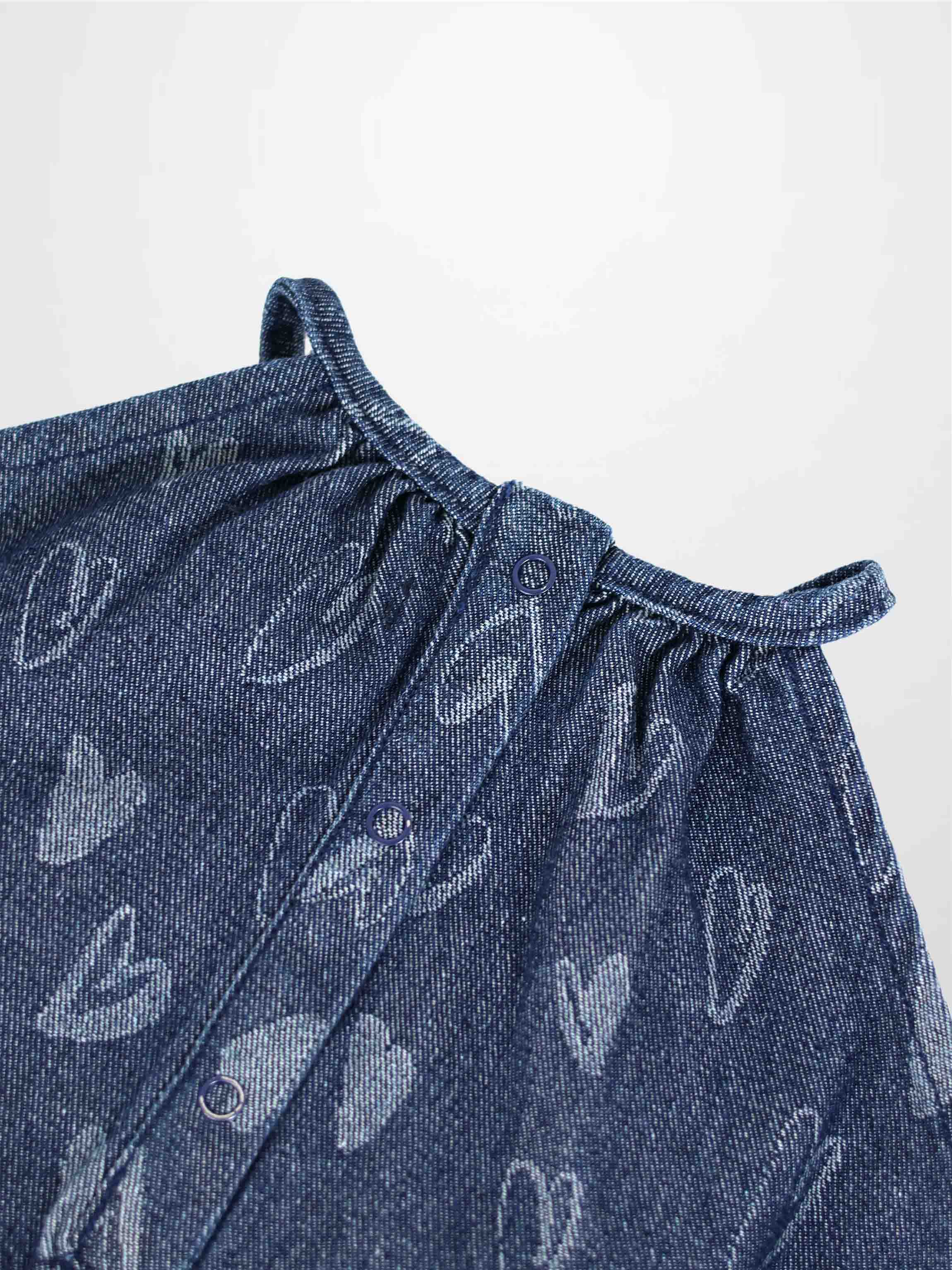 Denim Heart Romper for girls; blue denim fabric with light heart prints and snap-front placket.