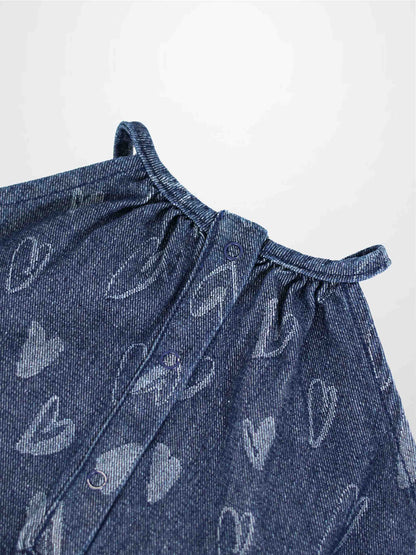 Denim Heart Romper for girls; blue denim fabric with light heart prints and snap-front placket.
