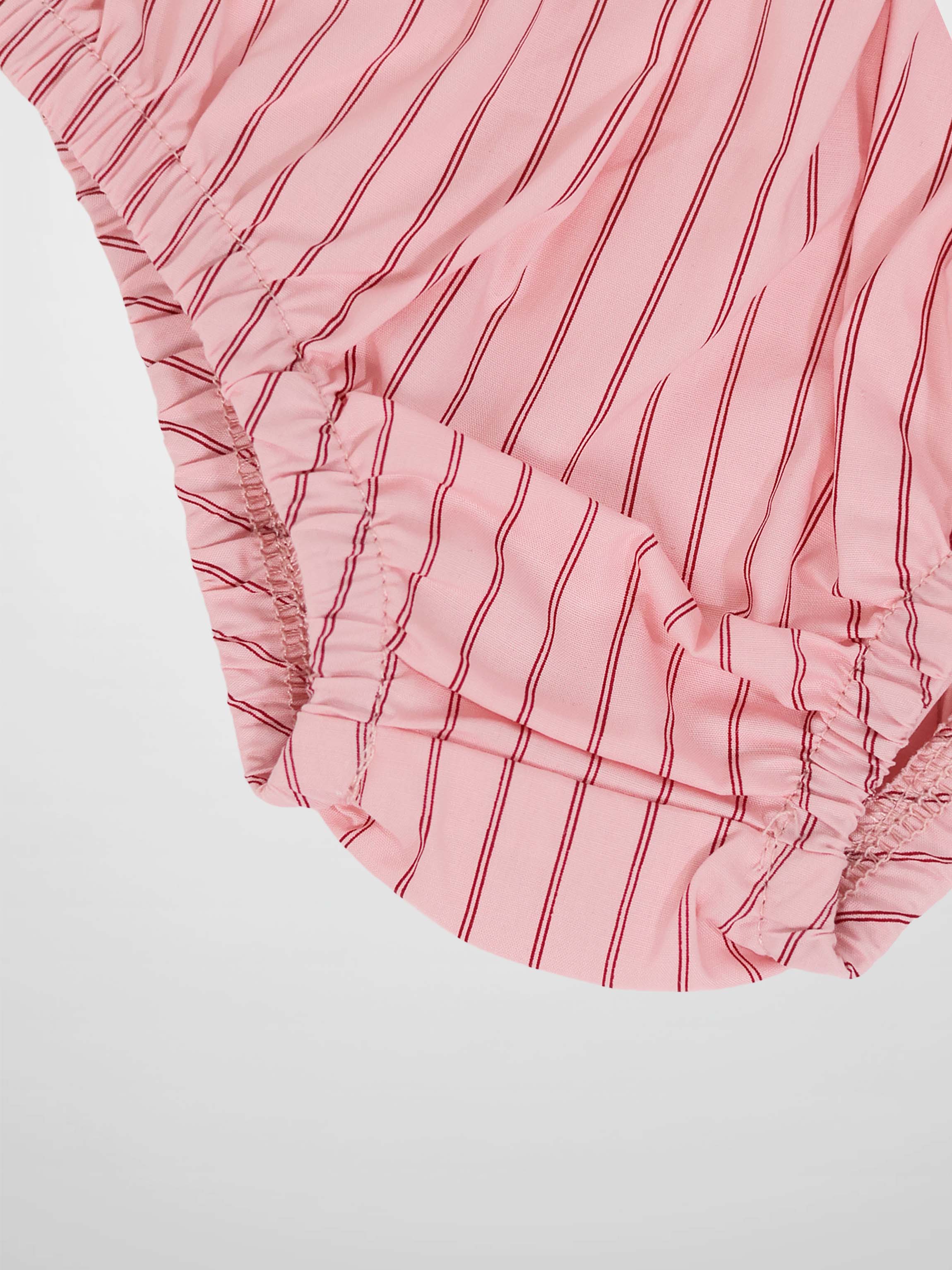 Striped pink cotton bloomers for girls with elastic waist and leg openings.