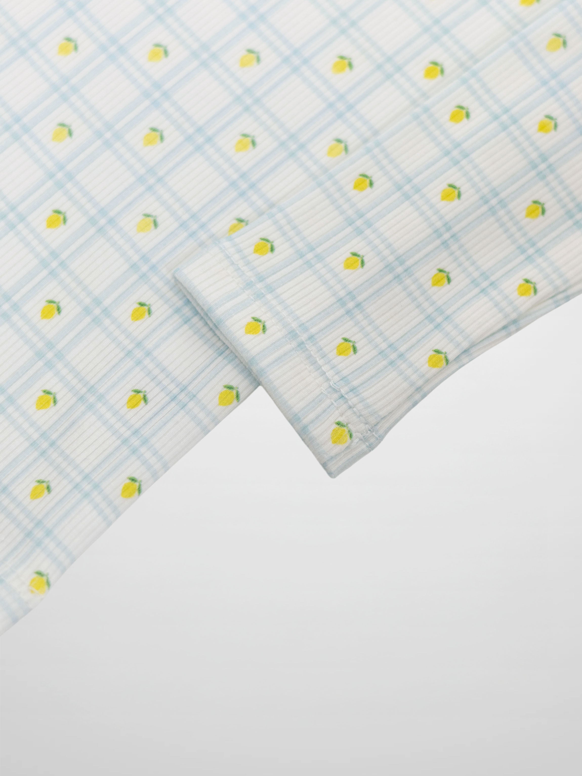Lemon Window Pajamas: white base with blue grid plaid and lemons; short-sleeve crewneck top for babies to big boys