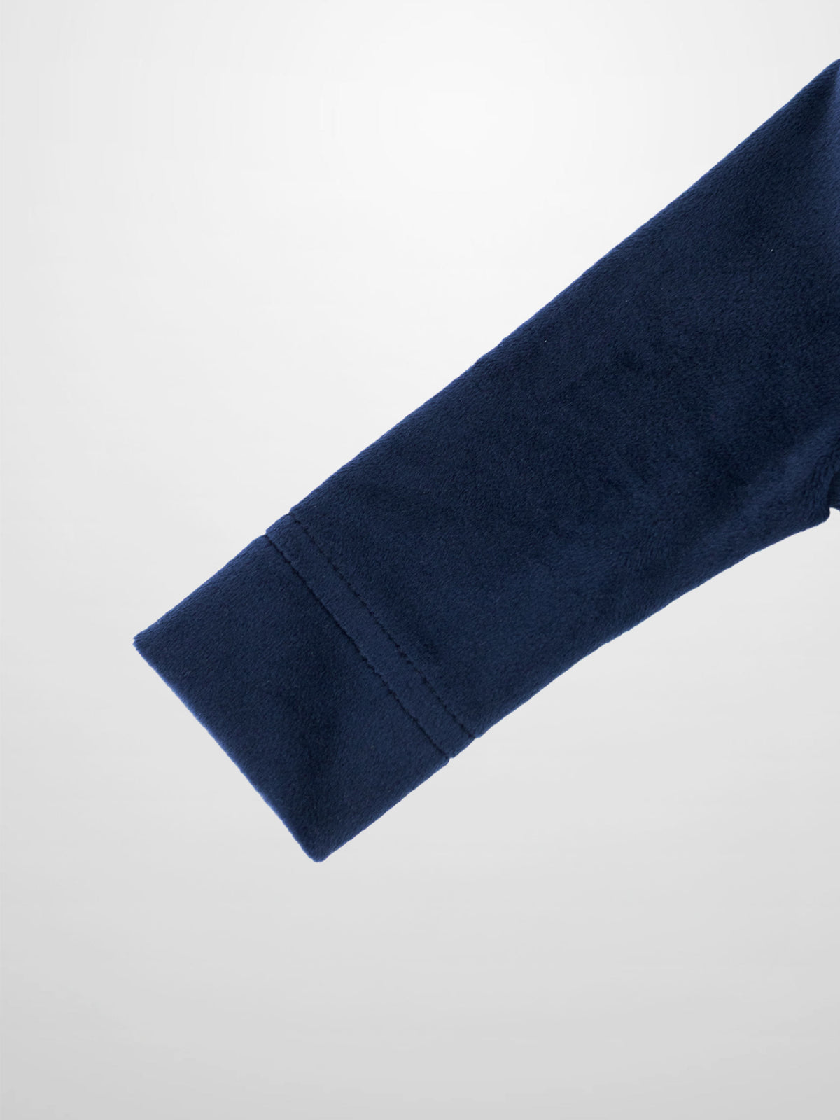 Navy plush velour fabric for Animal Band Stretchy baby footie, stitched seam detail.