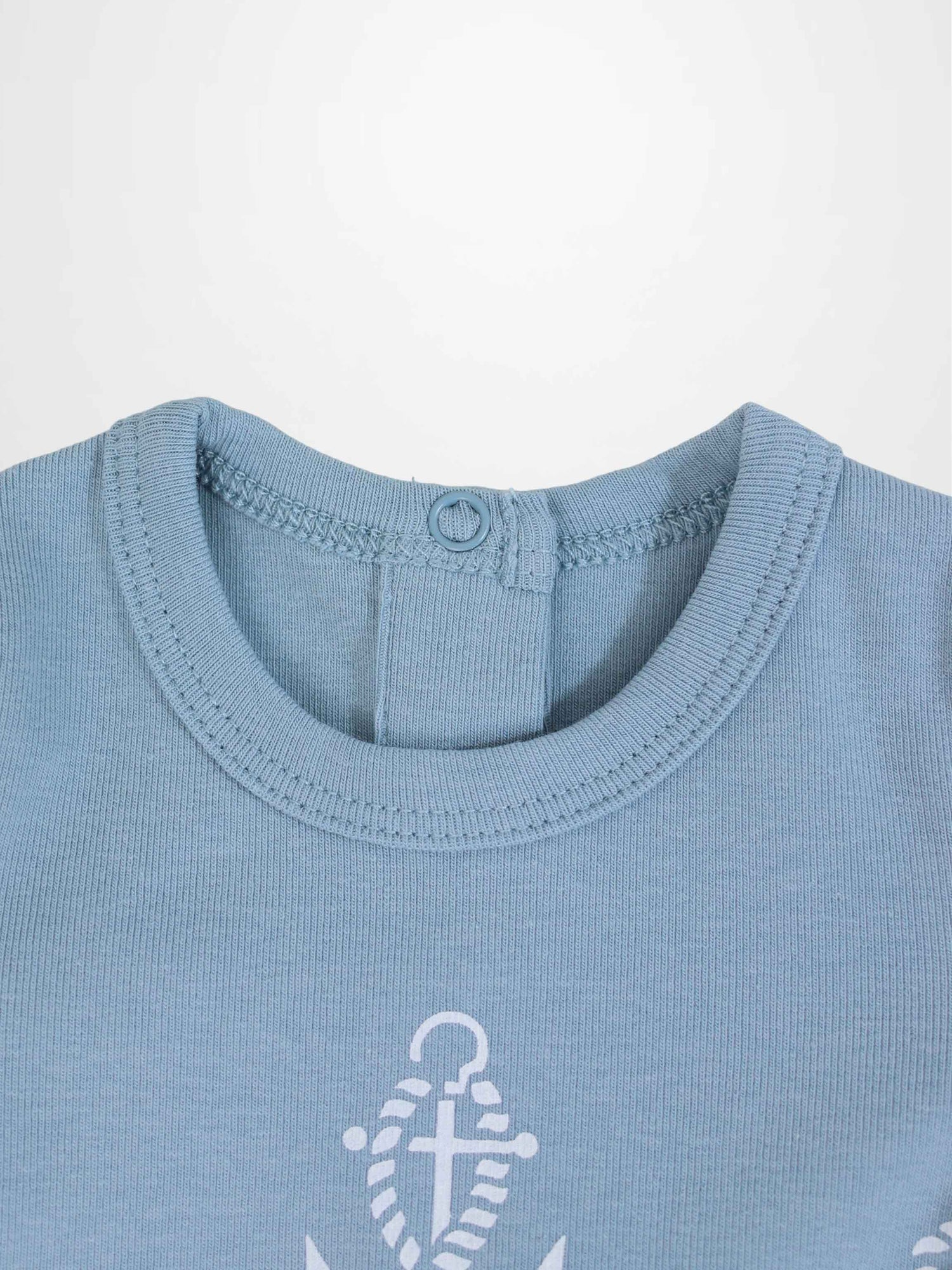 Blue Anchor Stretchy baby jumpsuit footie with white rope loops and centered anchor on breathable fabric.