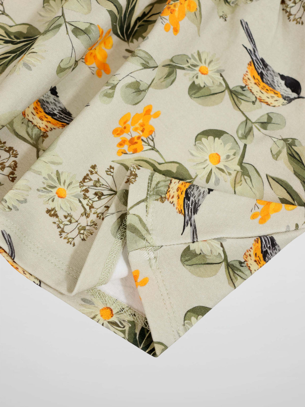 Garden Finch Circle Skirt for girls by Adee in beige with orange flowers and finch prints.
