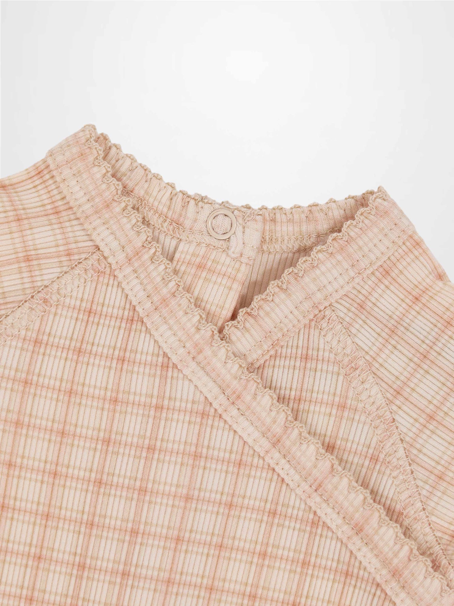 Oatmeal Grid Stretchy pink girls garment with ruffled neckline and back neck snap
