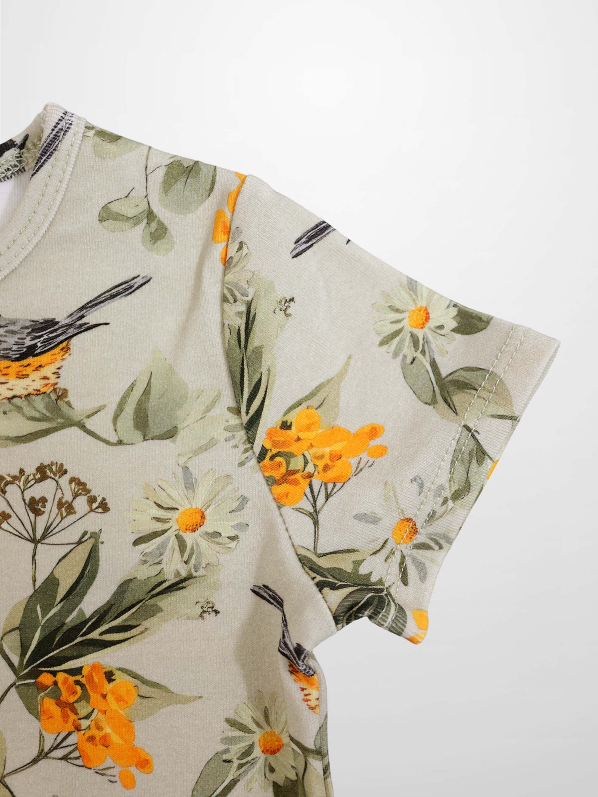 Garden Finch shorts set for little girls by Adee; beige floral-print top with orange flowers.