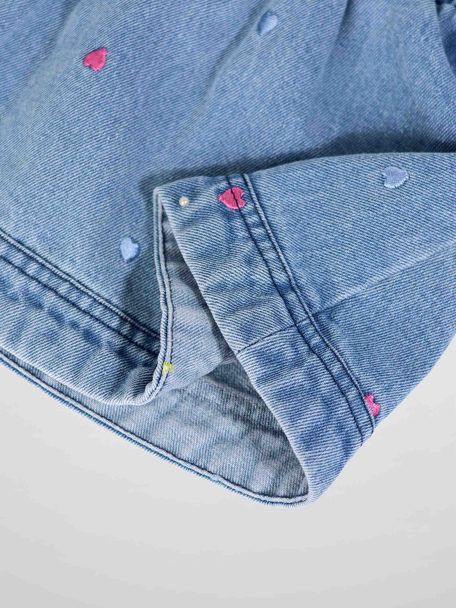 Adee Embroidered Heart Denim Skirt for girls, blue denim with pink and light-blue heart embroidery.