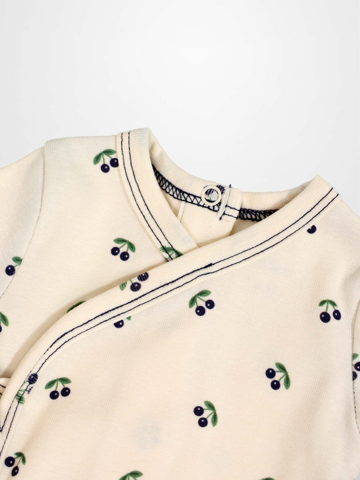 Blue Cherry Stretchy boys stretchies top; cream knit with blue cherries and green leaves