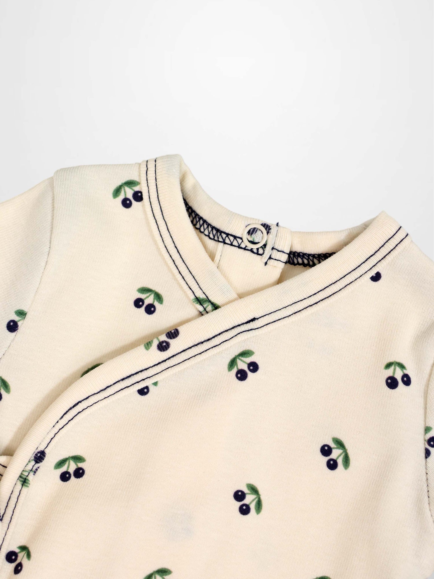 Blue Cherry Stretchy boys stretchies top; cream knit with blue cherries and green leaves