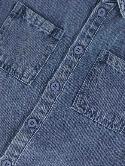 Blue denim button-down shirt for boys with front pockets and blue buttons