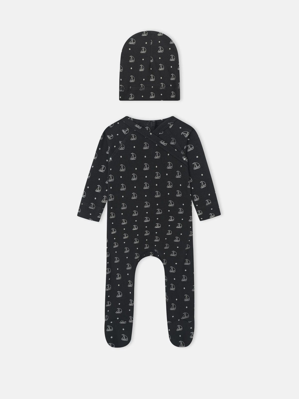 Harbor Dot layette set by Adee for baby boys; navy fabric with white sailboats, includes hat and romper.