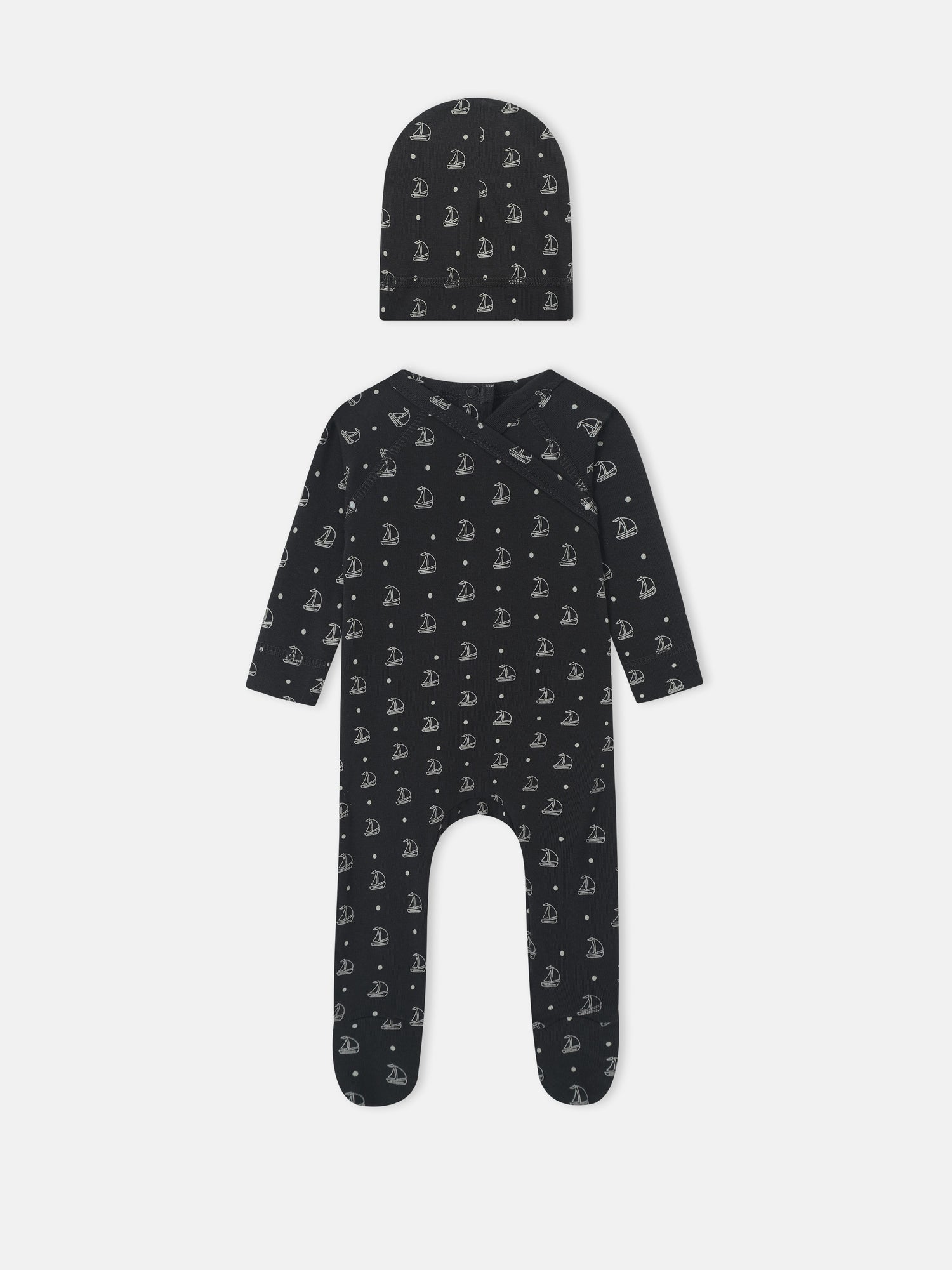 Harbor Dot layette set by Adee for baby boys; navy fabric with white sailboats, includes hat and romper.