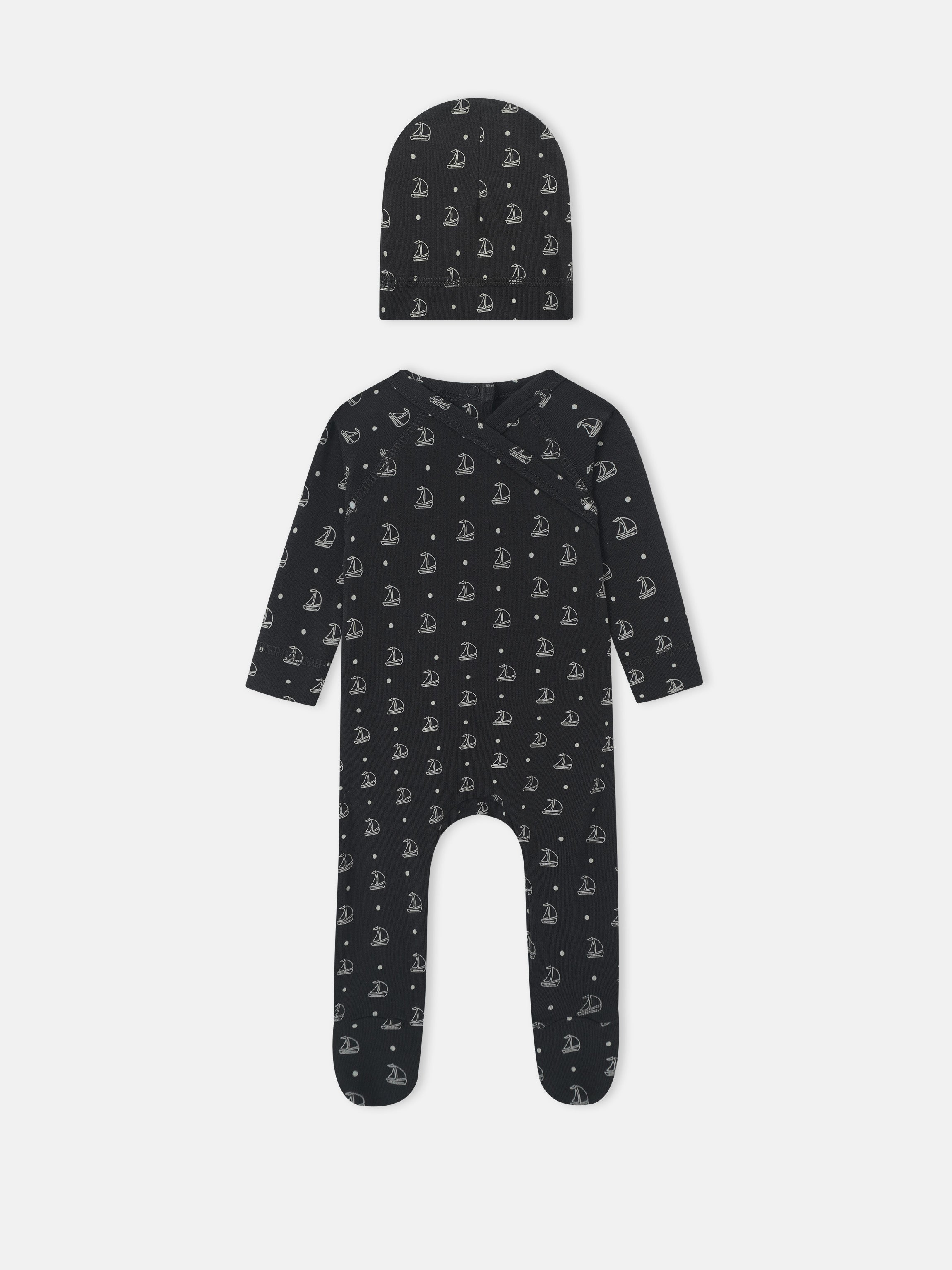 Harbor Dot layette set by Adee for baby boys; navy fabric with white sailboats, includes hat and romper.