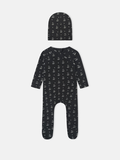Harbor Dot layette set by Adee for baby boys; navy fabric with white sailboats, includes hat and romper.
