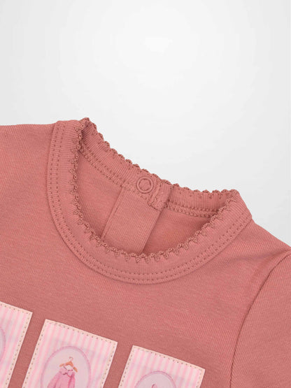 Cherry Frame Stretchy girls jumpsuit in muted pink knit with back neck snap closure.