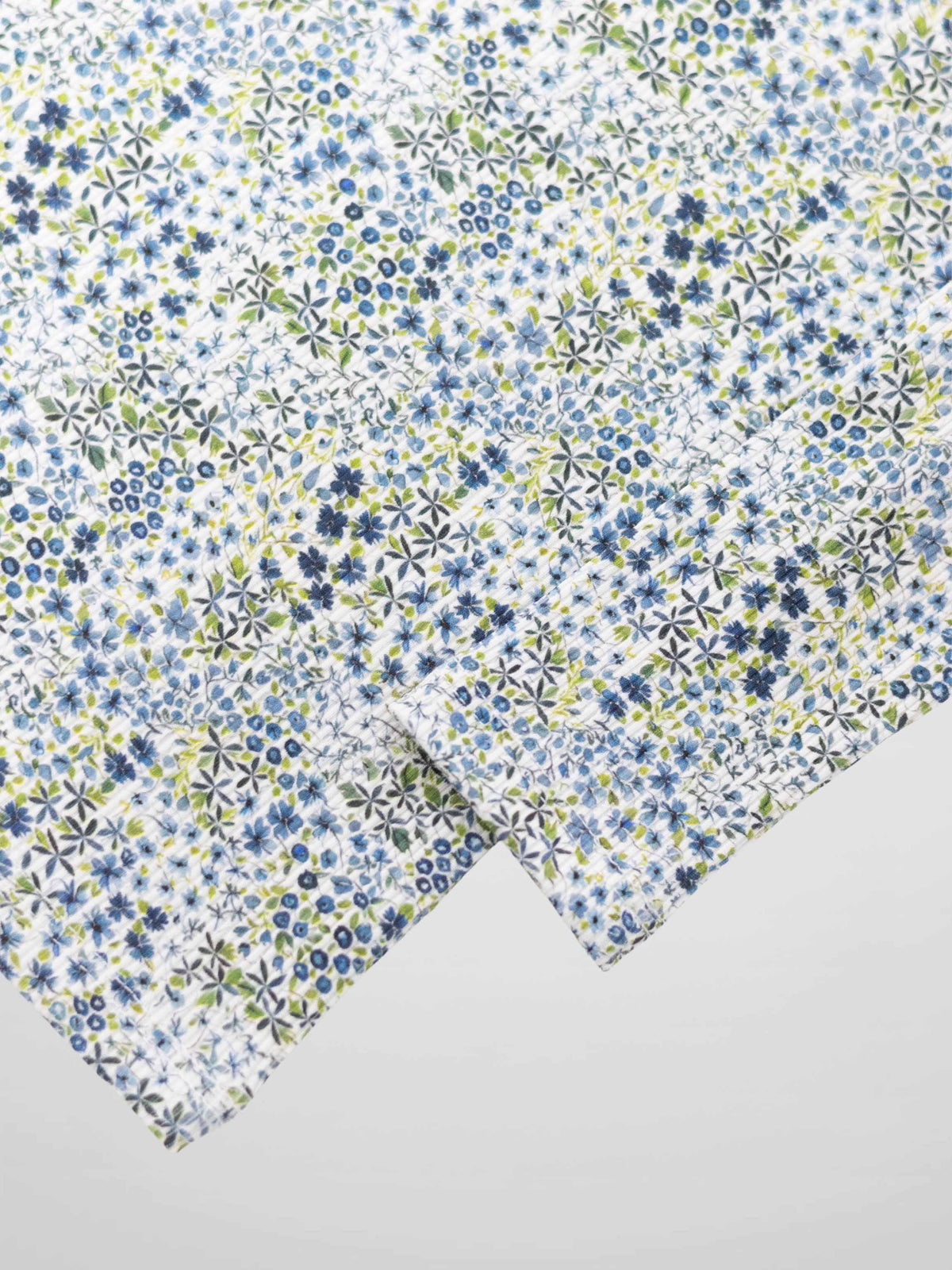 Girls blue floral pajamas with tiny blue flowers on white fabric
