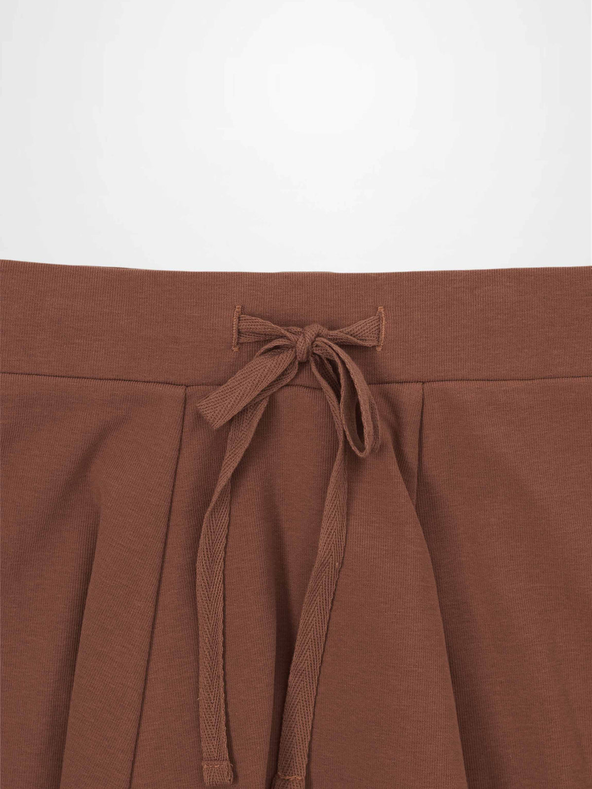Dark mauve 6-panel skirt with a waist-tie drawstring.