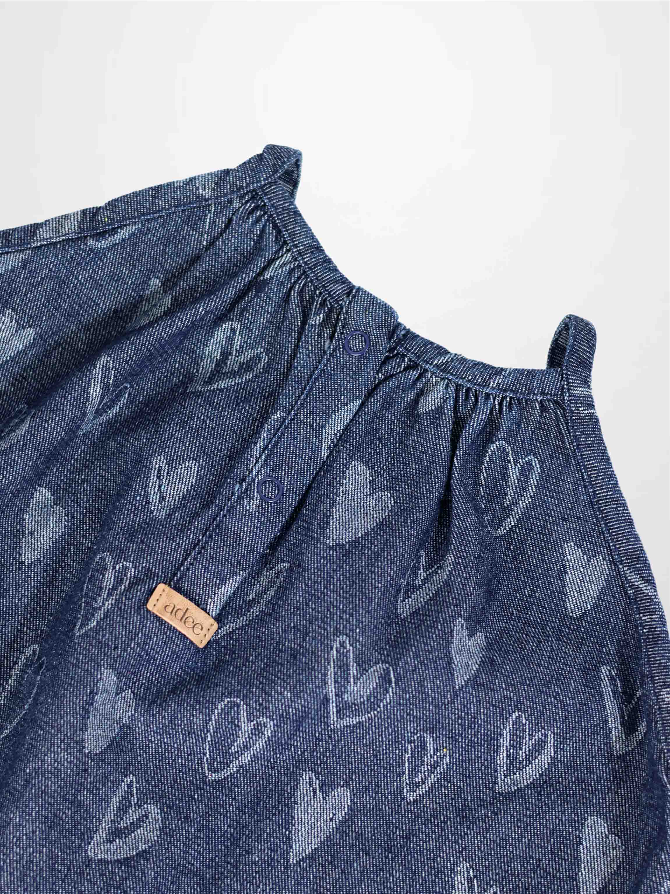 Adee Denim Heart Jumper for girls, blue denim with light heart prints and elastic neckline.