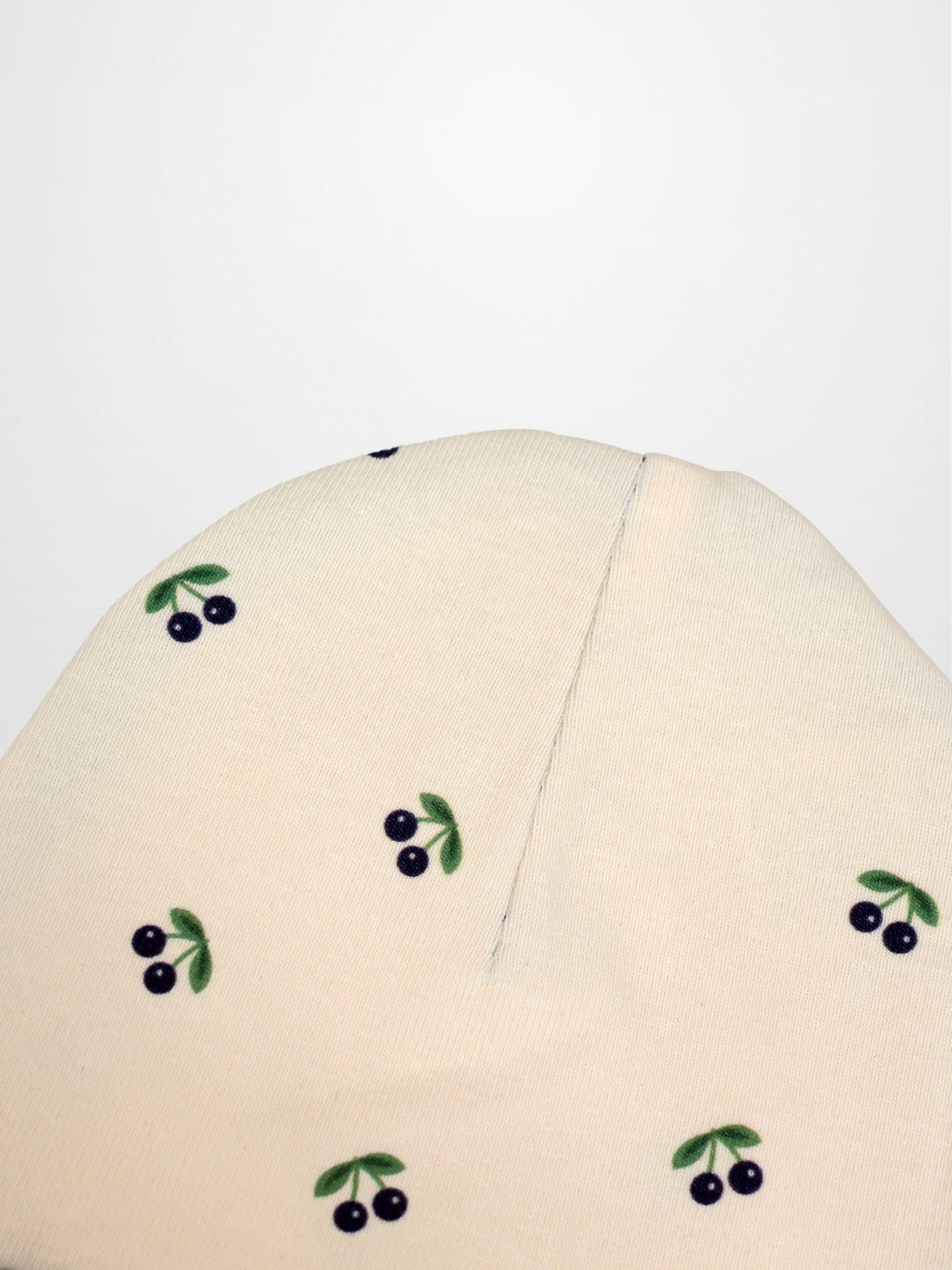 Blue Cherry Hat for boys; beige knit fabric with blue cherry print