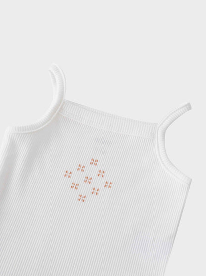 White bodysuit with diamond pattern
