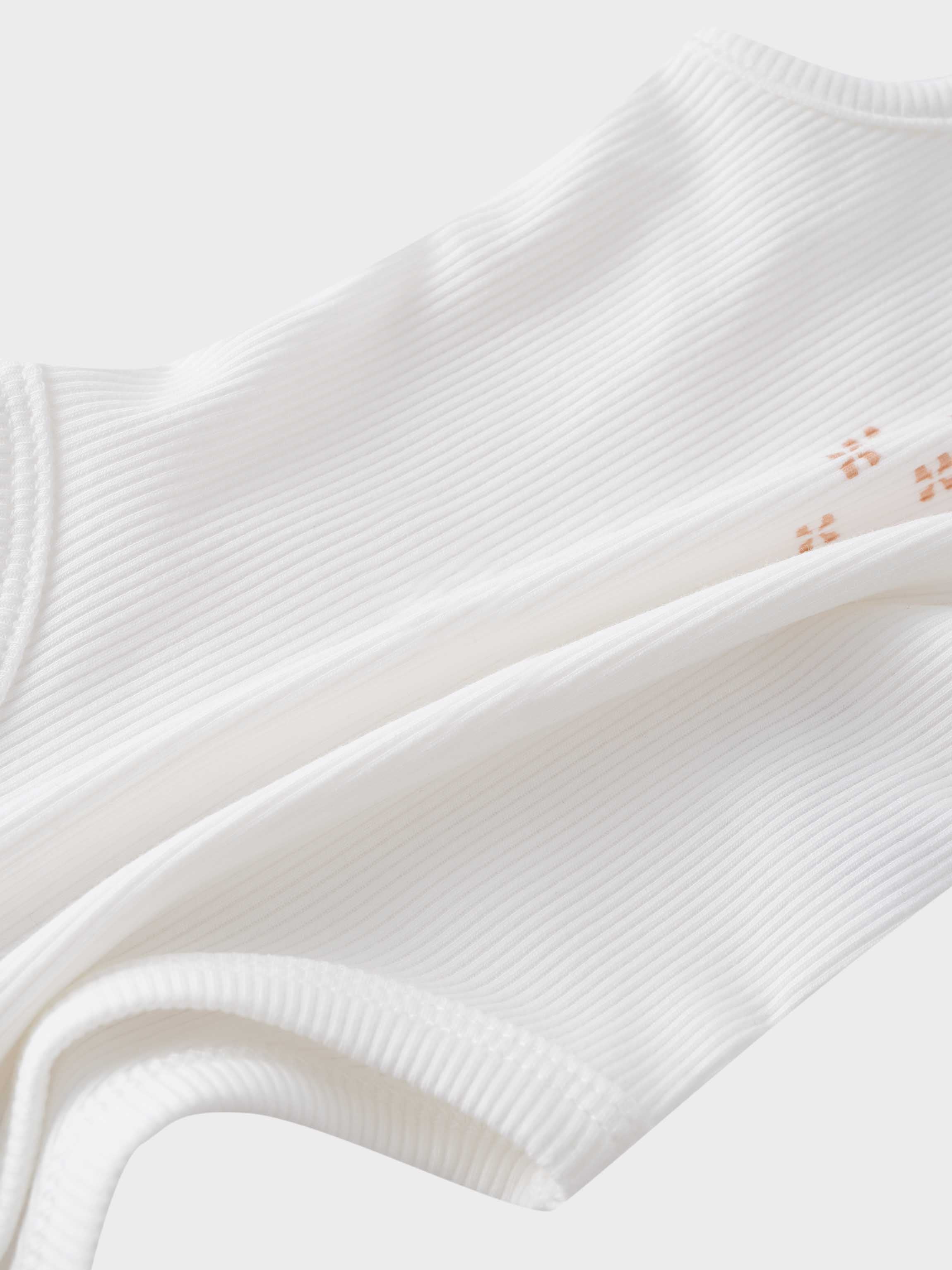White ribbed baby bodysuit fabric