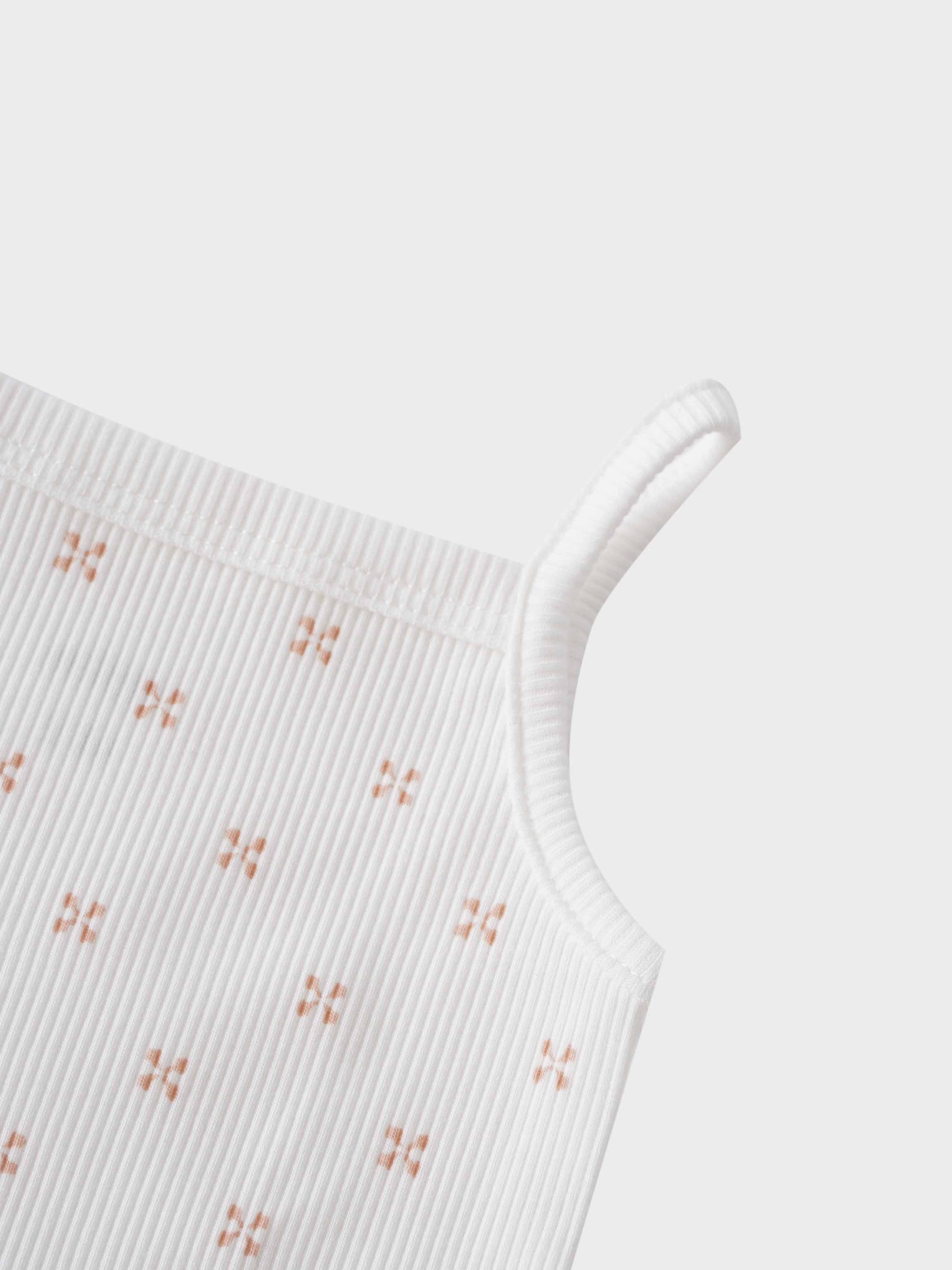 Pink diamond patterned baby bodysuit