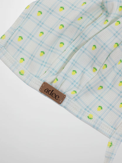 Lemon Window Bonnet for boys by Adee; light blue plaid with tiny yellow lemons.