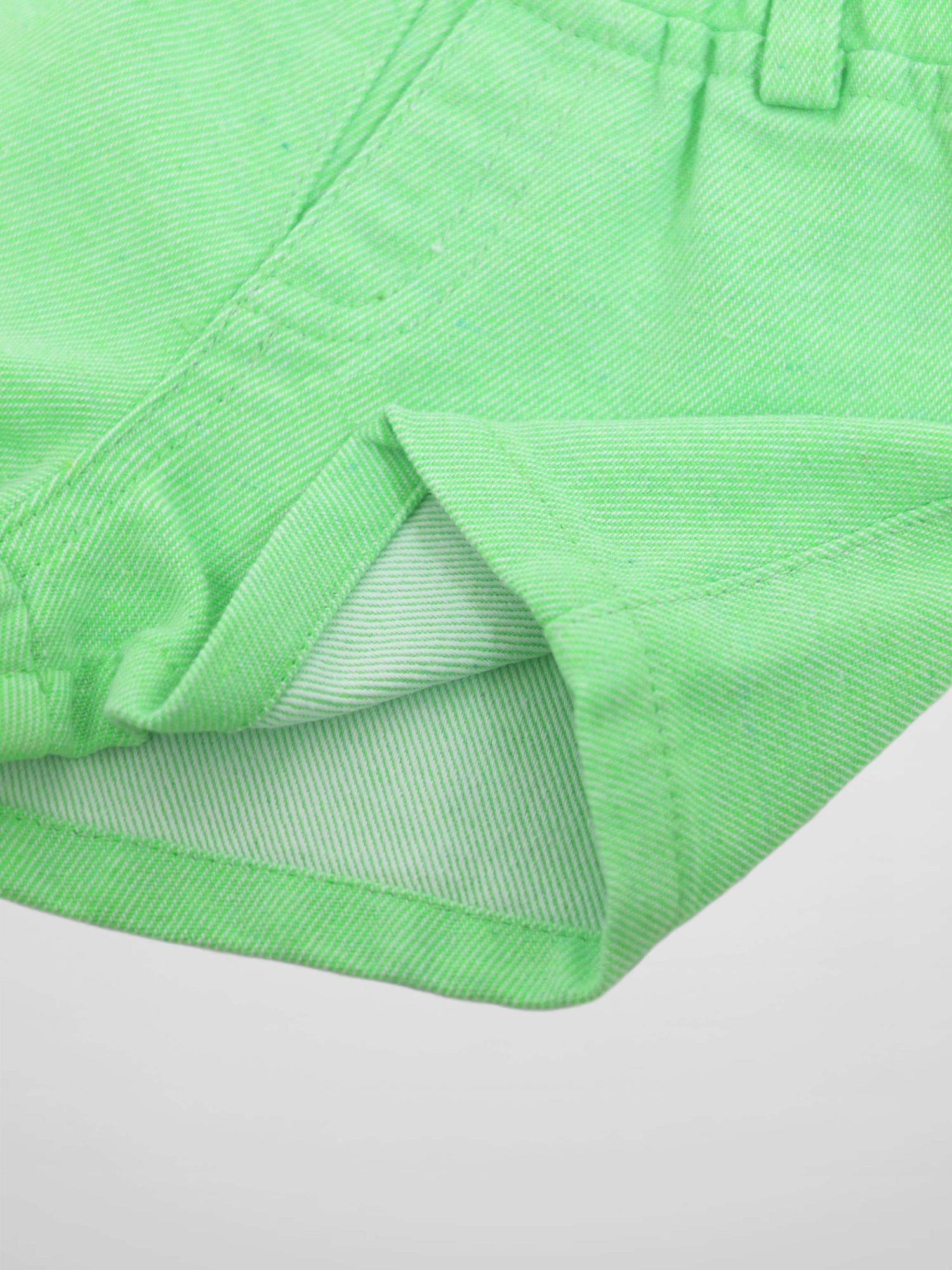 Denim shorts for boys in neon green fabric with folded hem