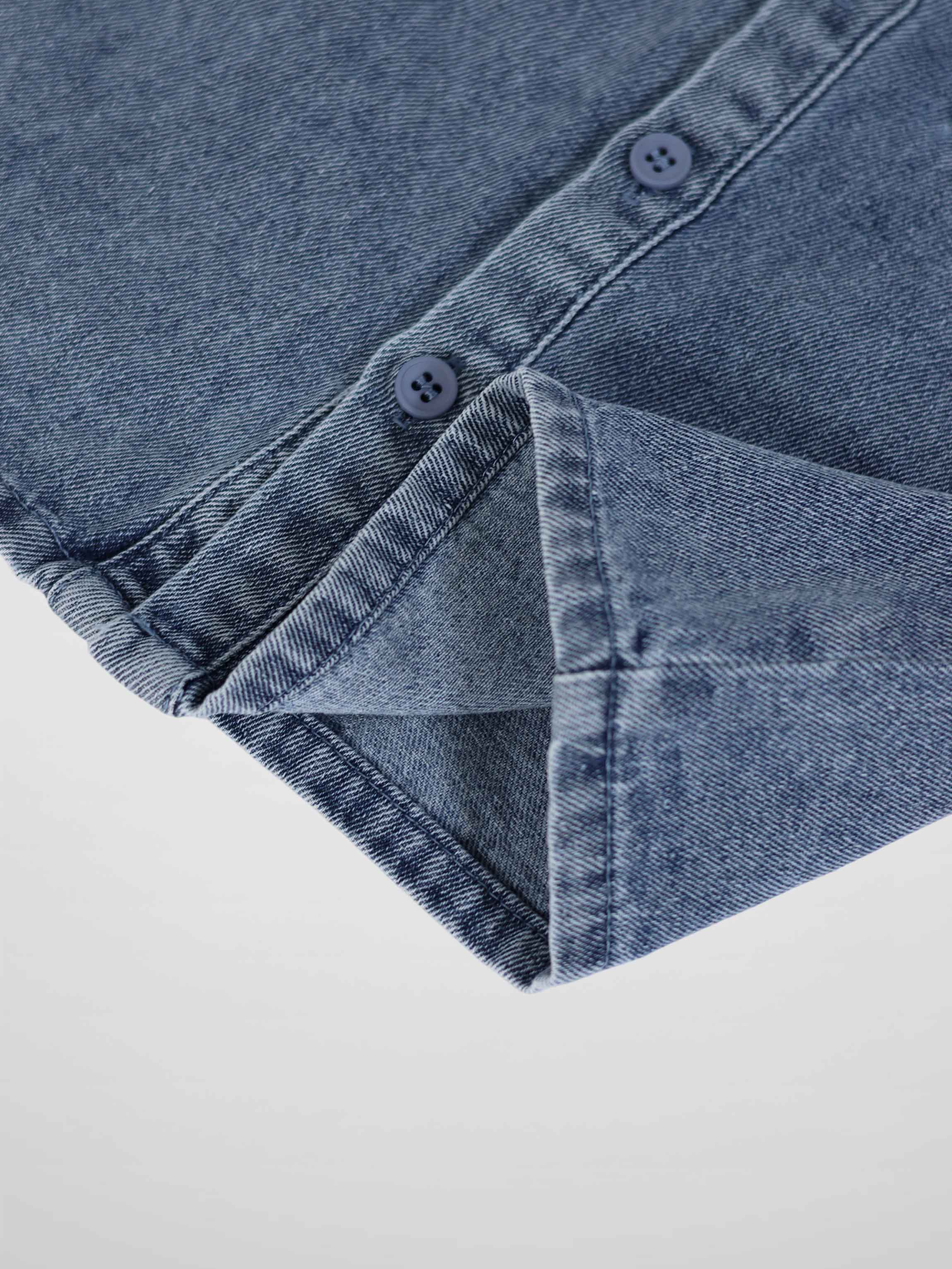 Blue denim button-down shirt for boys with front buttons and folded cuff