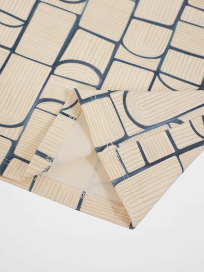 Abstract T-shirt for boys by Adee featuring a light-blue geometric print on beige fabric, suitable for everyday wear.