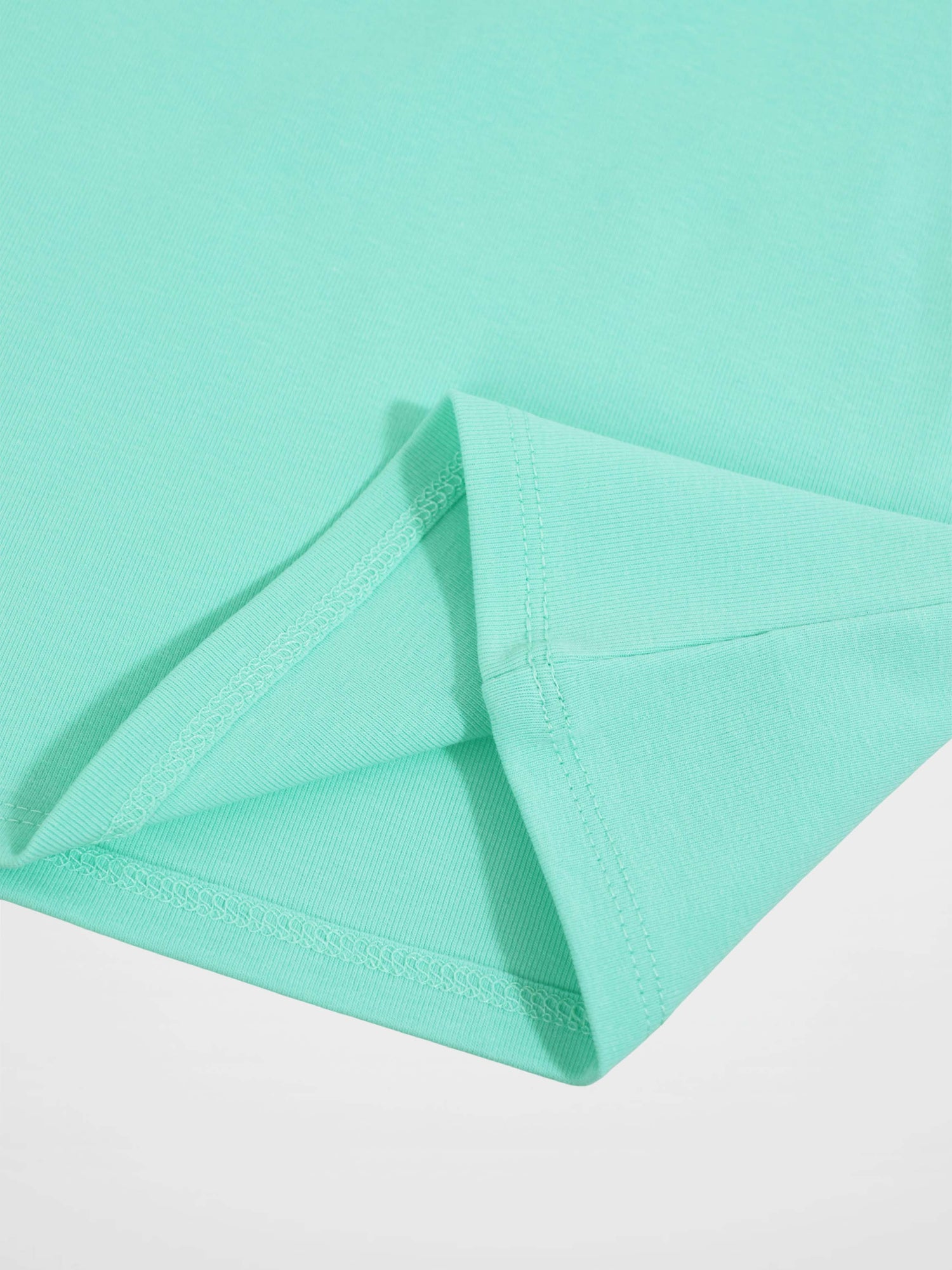 Thin ribbed mint green T-shirt fabric with folded hem and visible stitching.