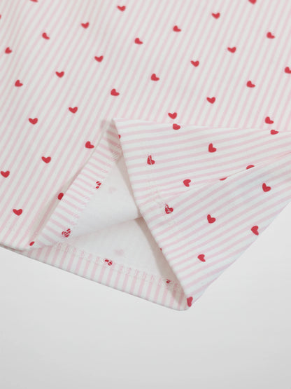 Pink Heart Pajamas for girls; pink-and-white striped fabric with small red hearts.