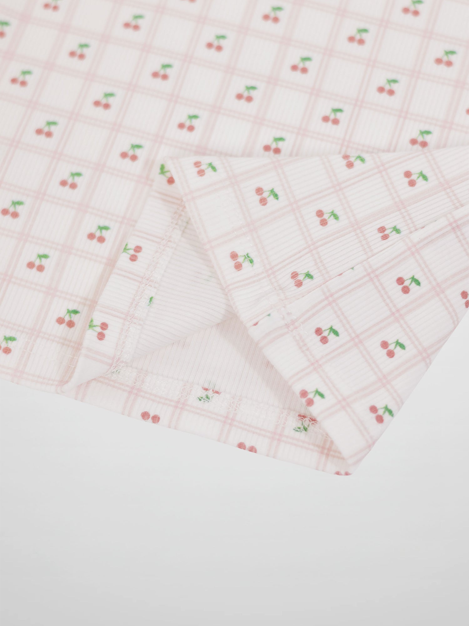 Cherry Window Pajamas for girls in light pink plaid with small cherries