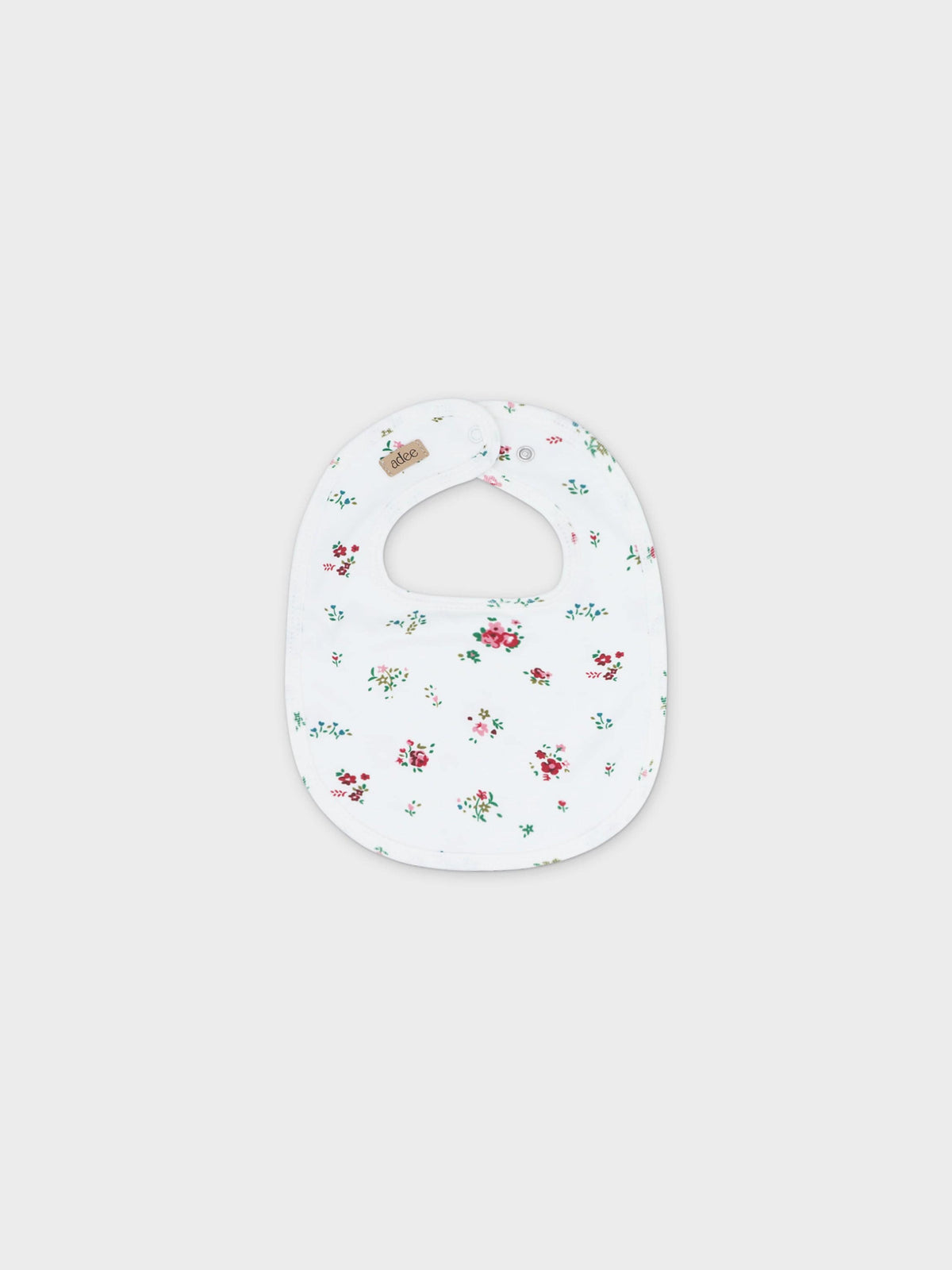 Baby jumpsuit bib with floral pattern