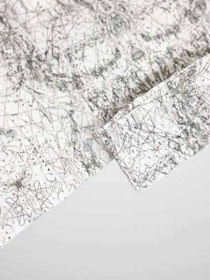 Map Stretchy: off-white fabric with sage-green map lines and compass markers.