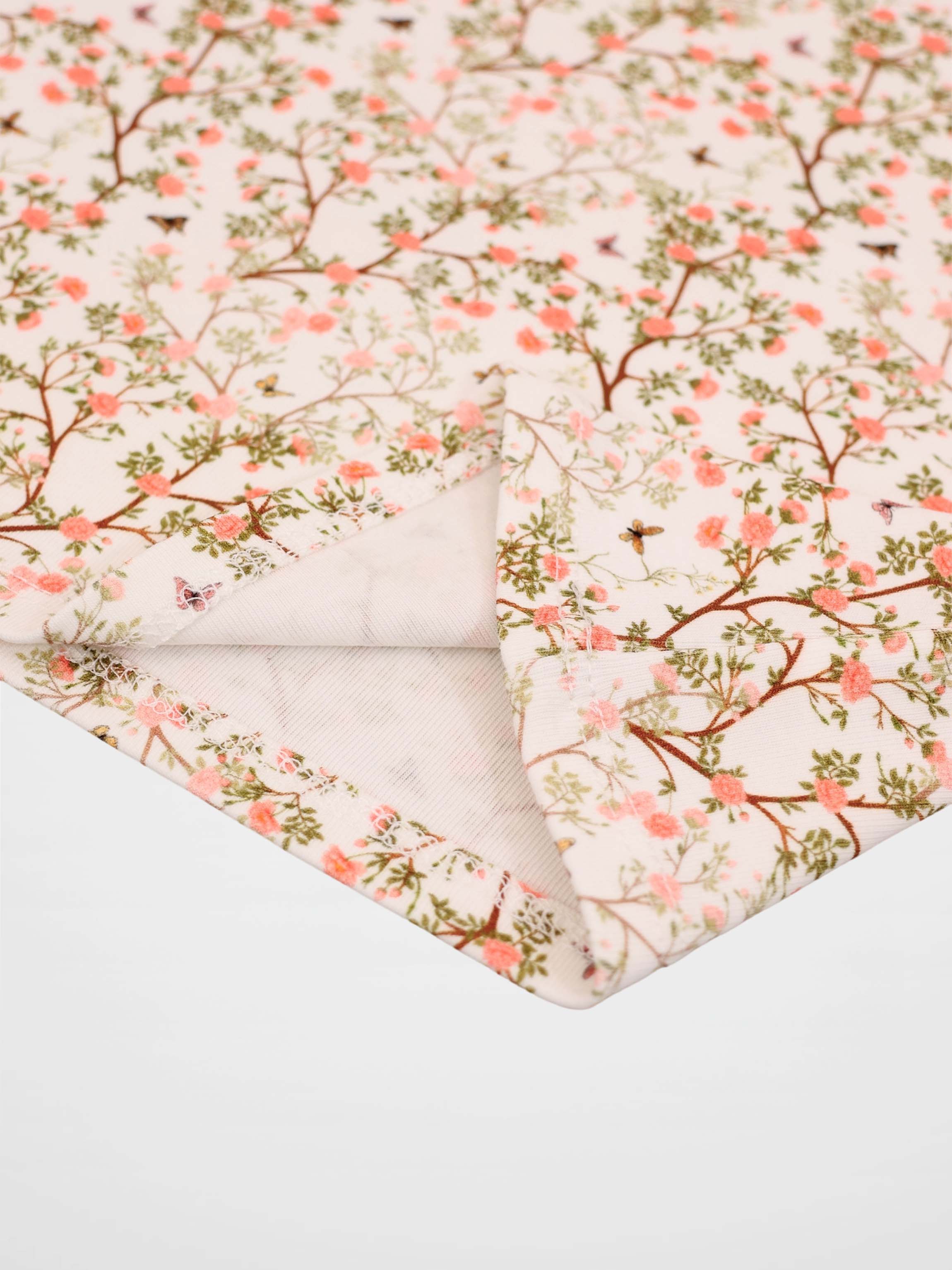 Spring Floral Short Sleeve T-Shirt; pink blossom print on pale background.