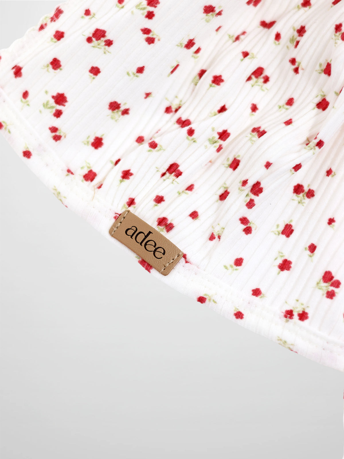 Red Flower Bonnet for girls by Adee; white pleated fabric with tiny red flowers