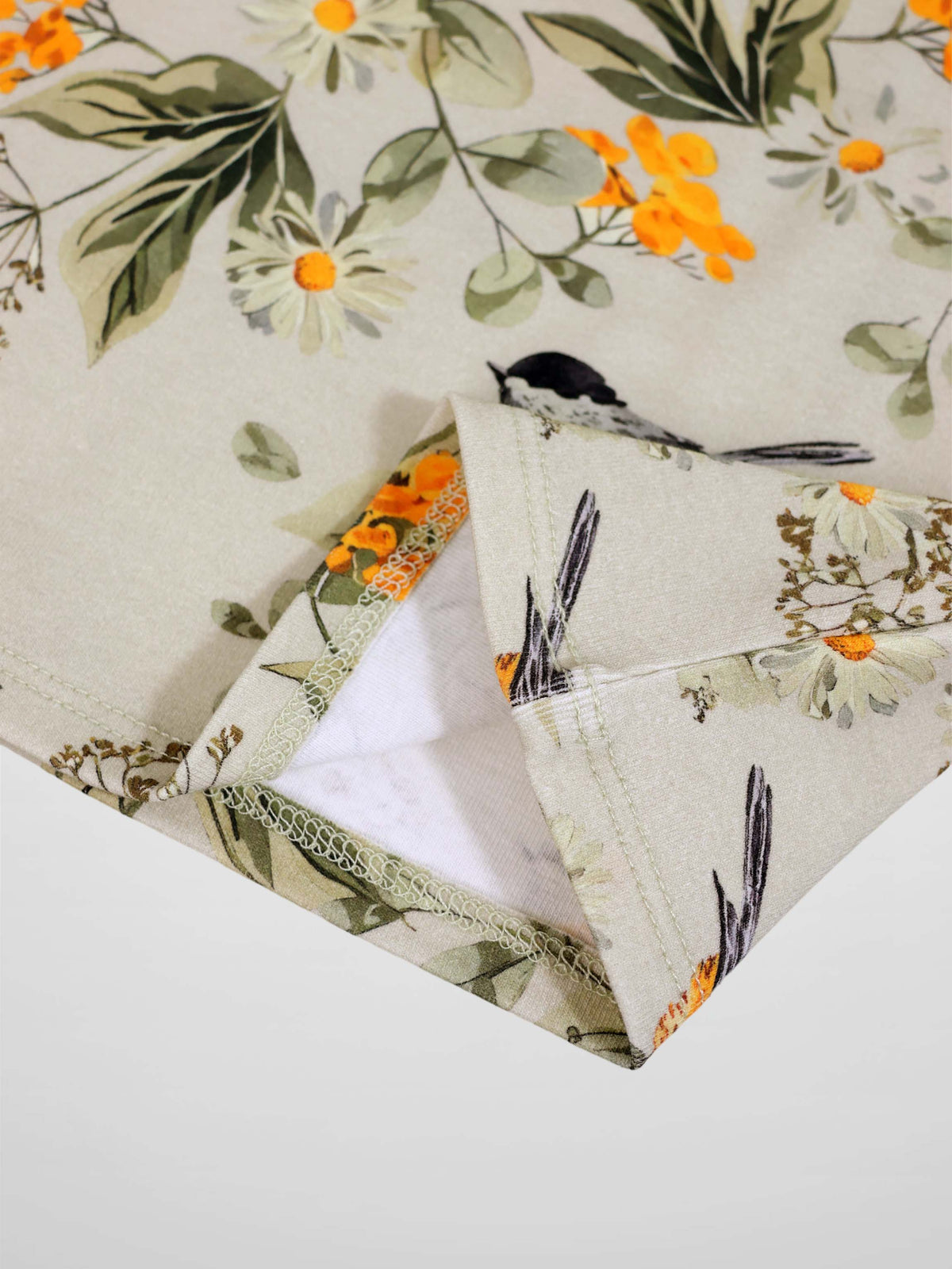 Garden Finch Short Sleeve T-Shirt by Adee; beige floral print with orange blossoms and a small finch