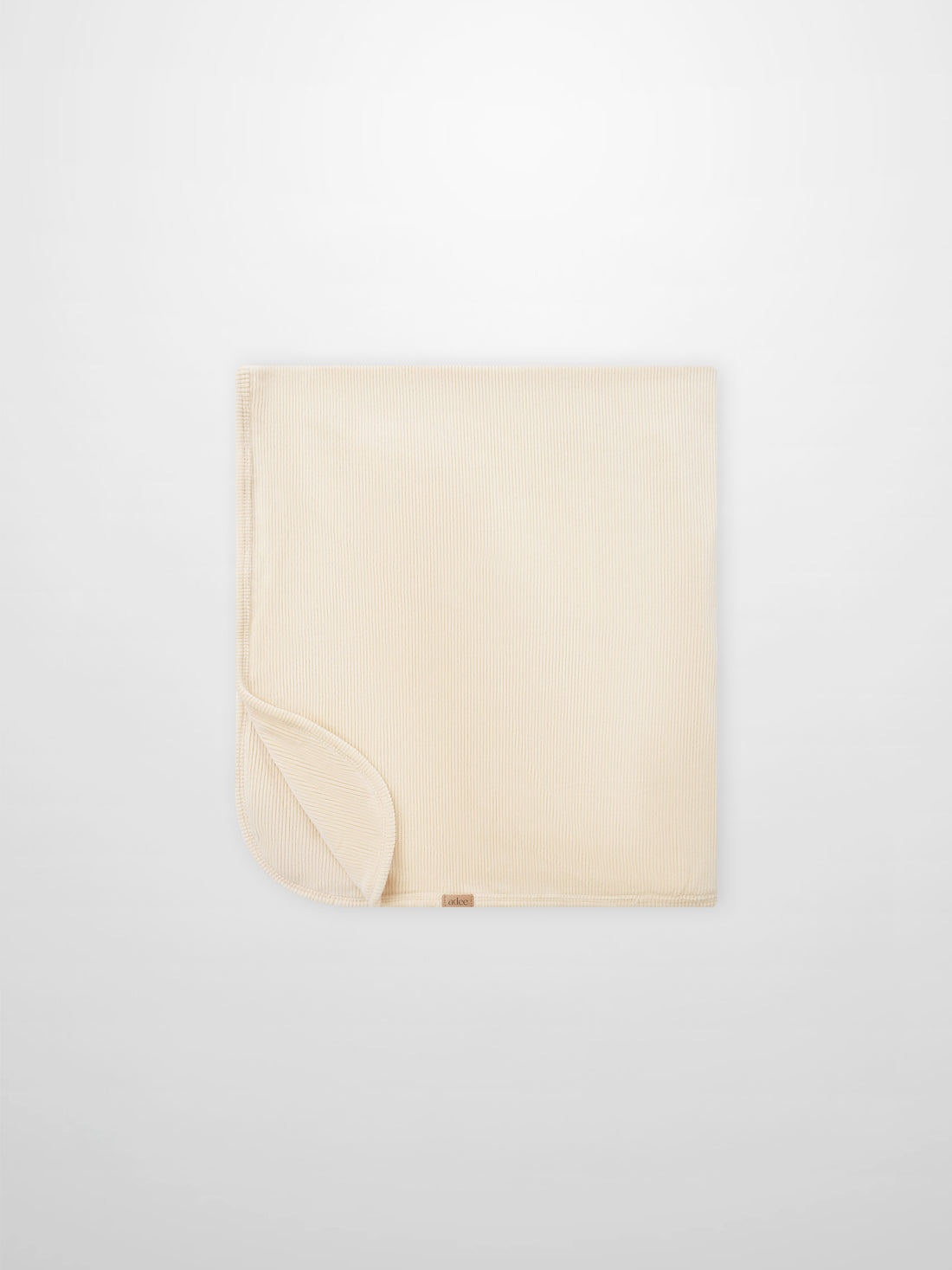 Embroidered Anchor Blanket by Adee; beige ribbed boys swaddle blanket with anchor motif.